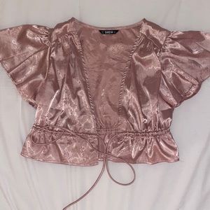 Pink tie-front crop top